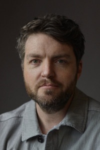 الممثل Tom Burke
